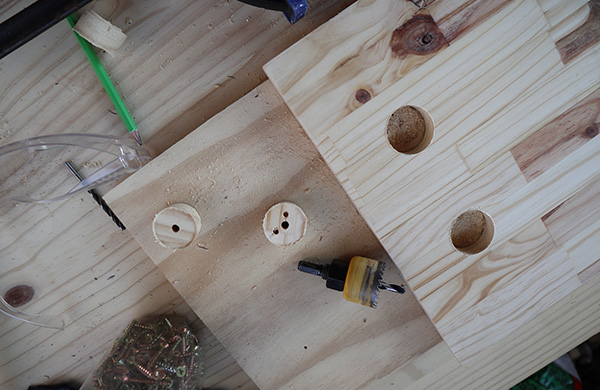 Cut out the round edges of side handles of tray