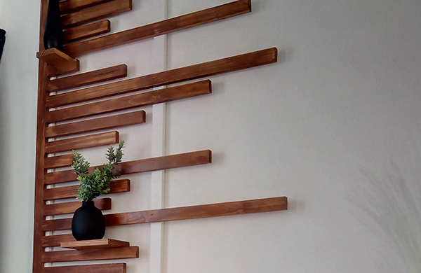 Secure and cover with wood filler.